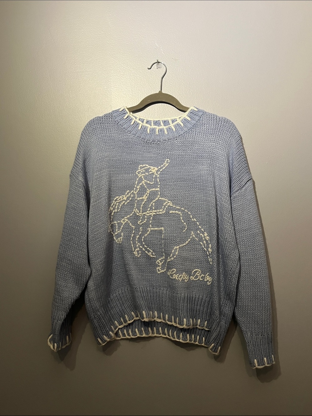 Light Blue Crewneck Sweater with White Rodeo Motif